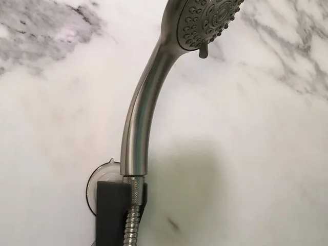 Shower wand holder
