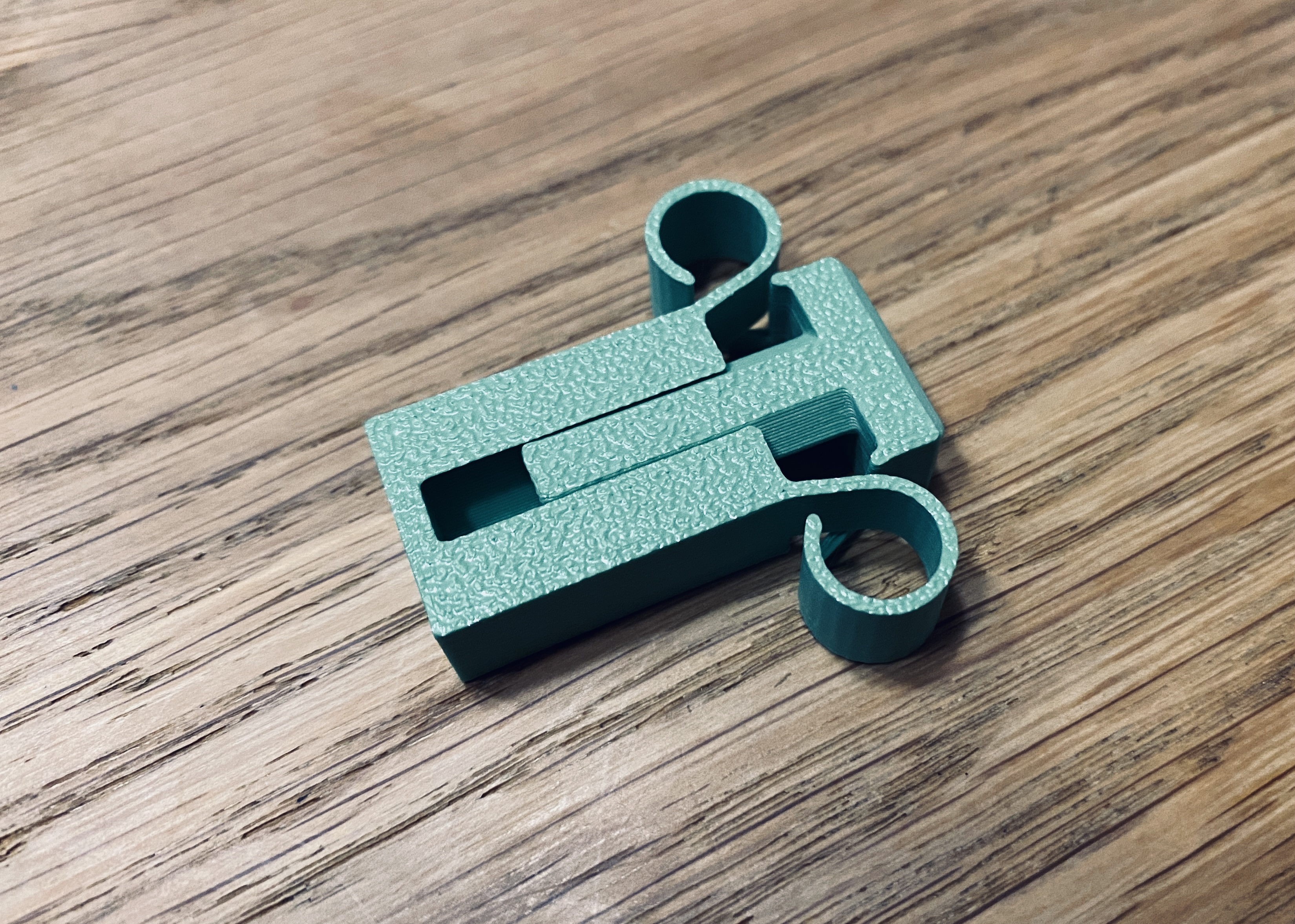 Print in-place spring button