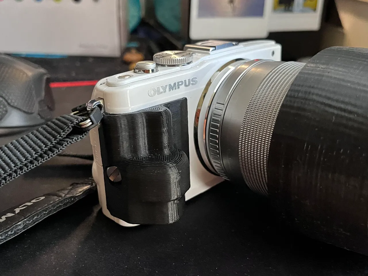 Olympus E-PL5 gripper by Jianjiesama | Download free STL model