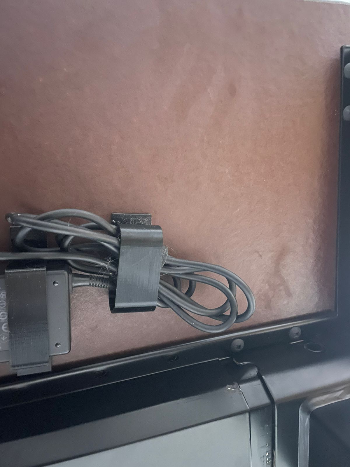 Under desk cable holder