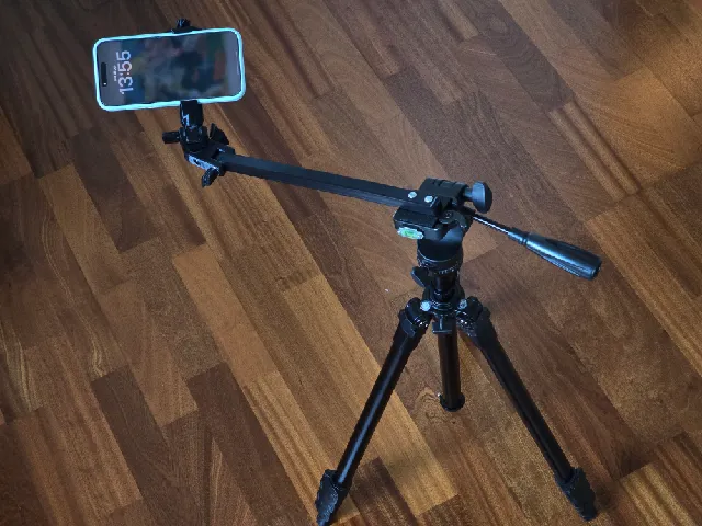 Phone holder for camera tripod