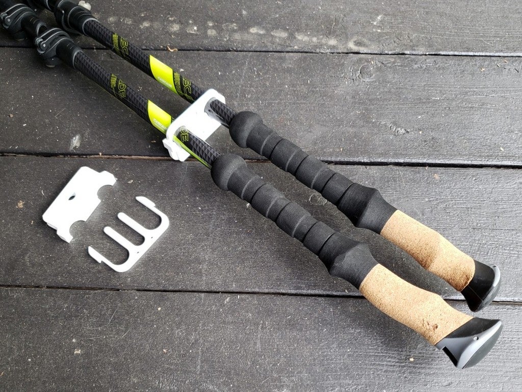 Trekking / hiking pole storage clips