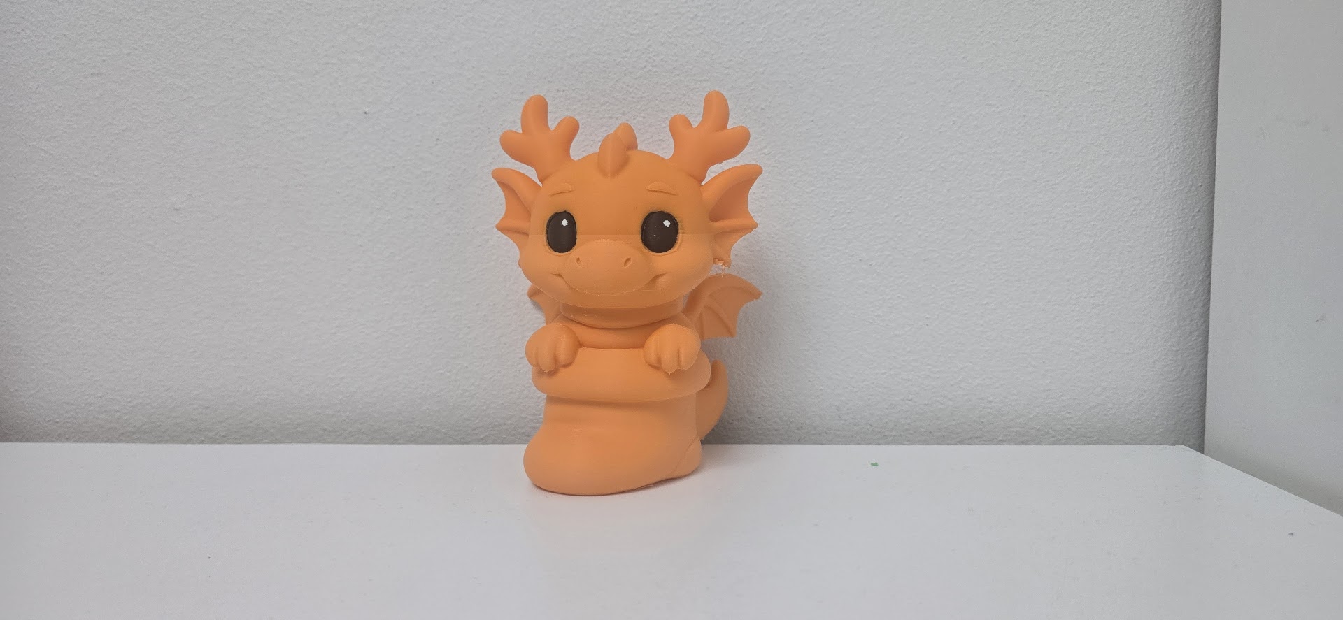 Baby Dragon in Christmas Stocking