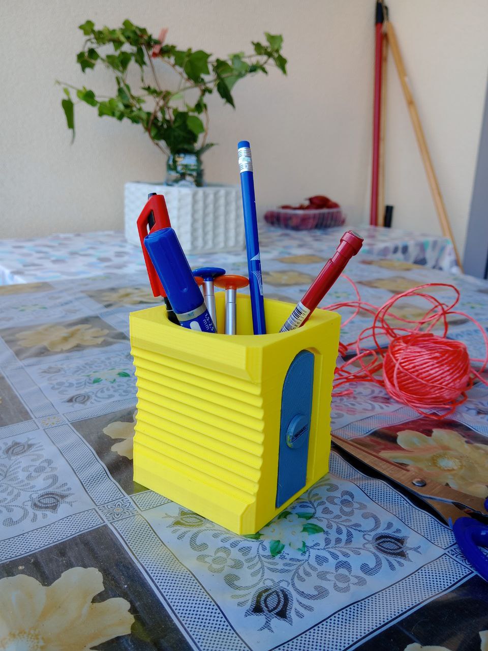 pencil holder in the shape of a pencil sharpener