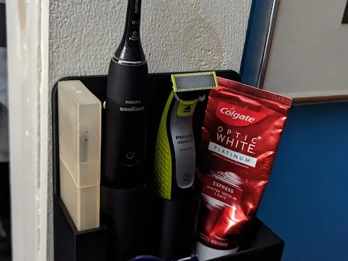 Toiletry wall organizer