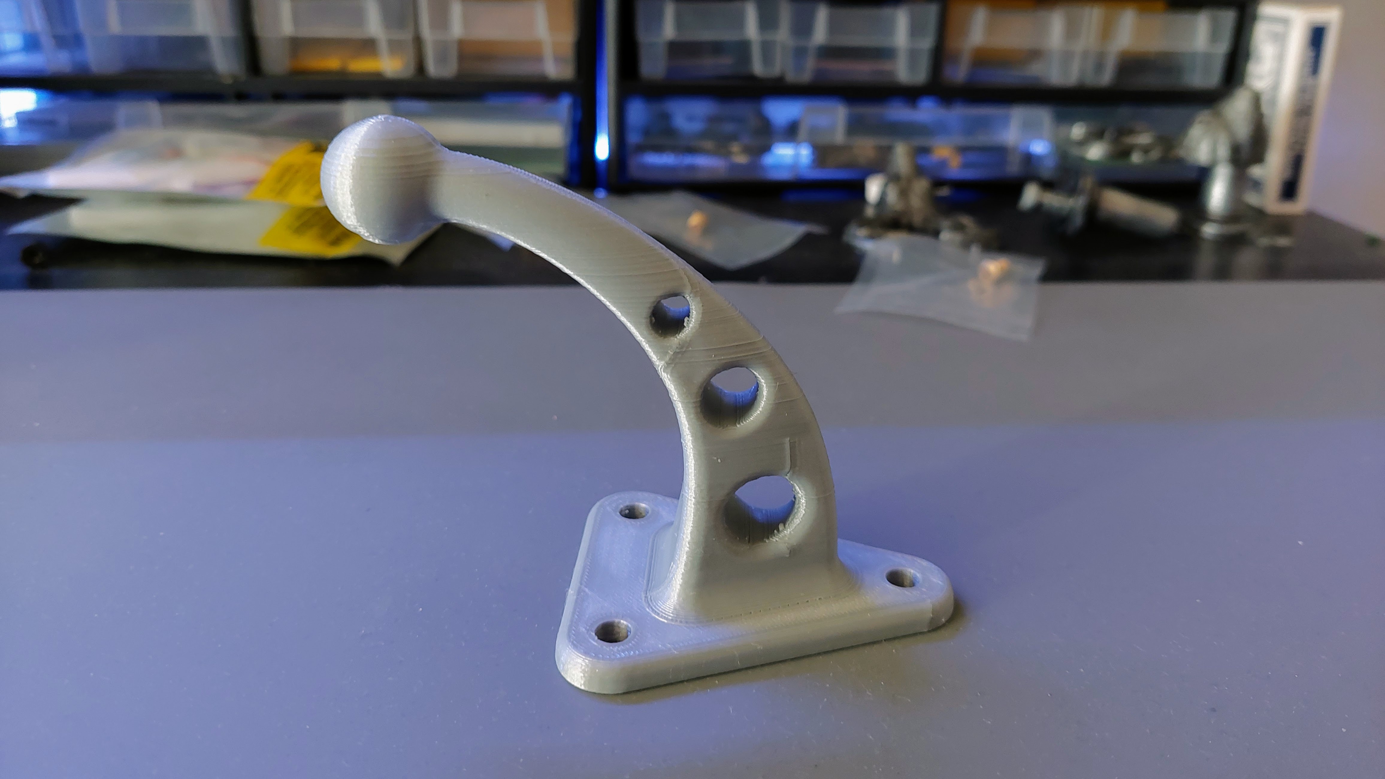 Coat hook with holes for coat hangers