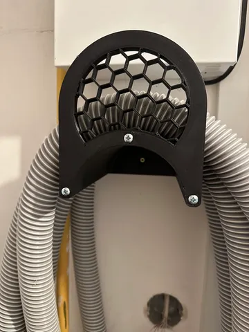 Vacuum hose holder