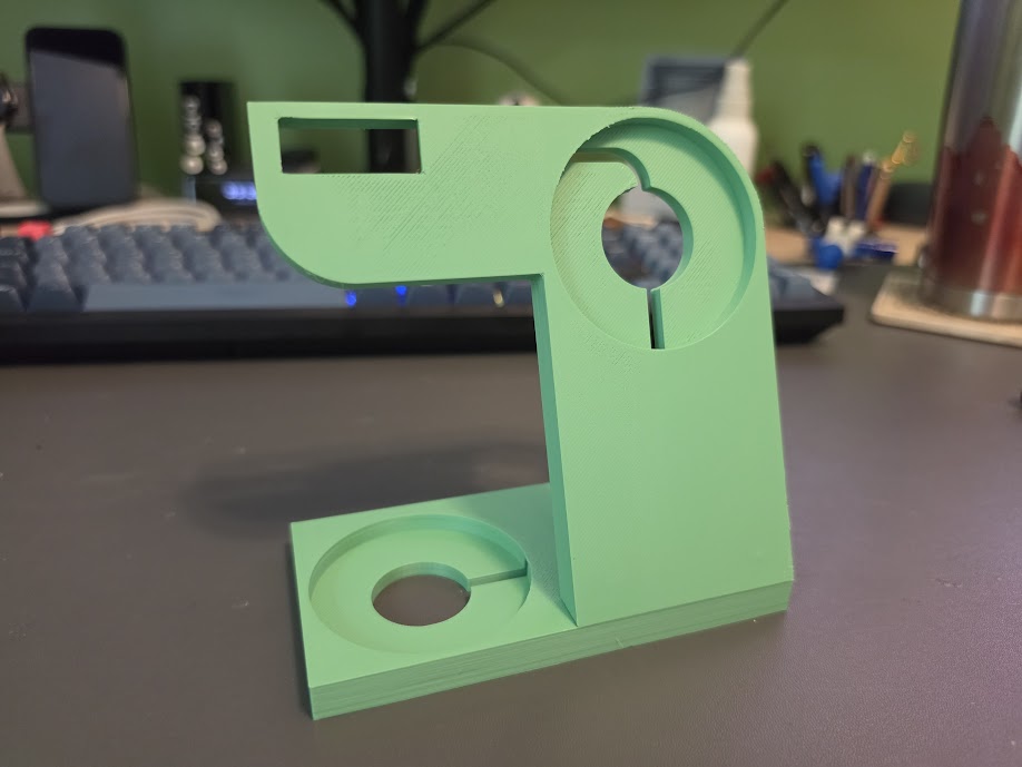 Phone charging stand with Pebble