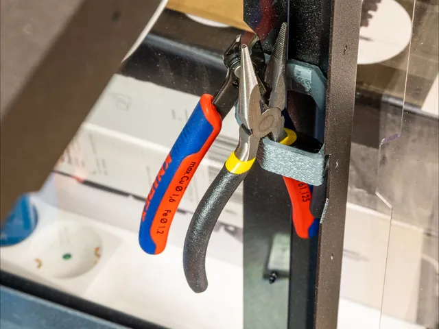 Enclosure corner tool holder