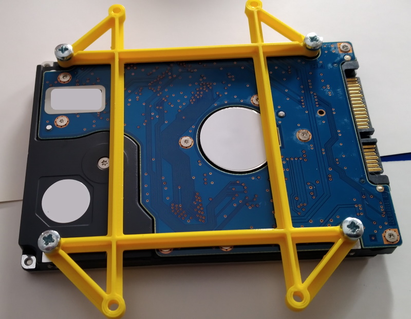 Hard disk mounting adapter by Printing Programmer Download free STL