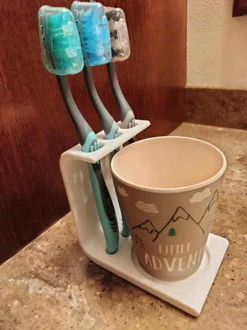 Toothbrush and cup holder