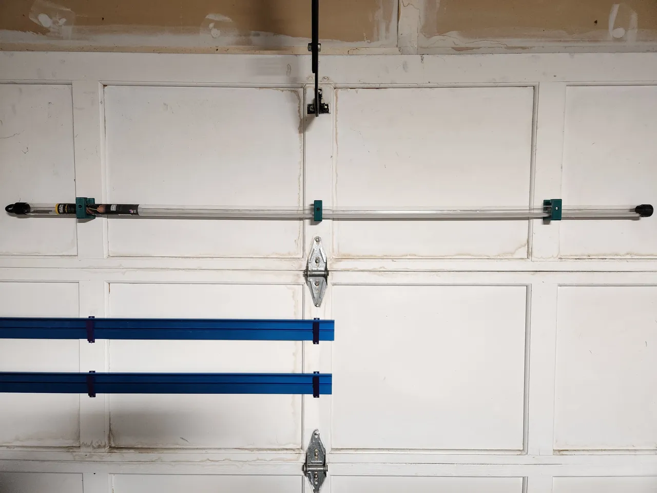 DIY Fishing Pole Garage Door Holder 