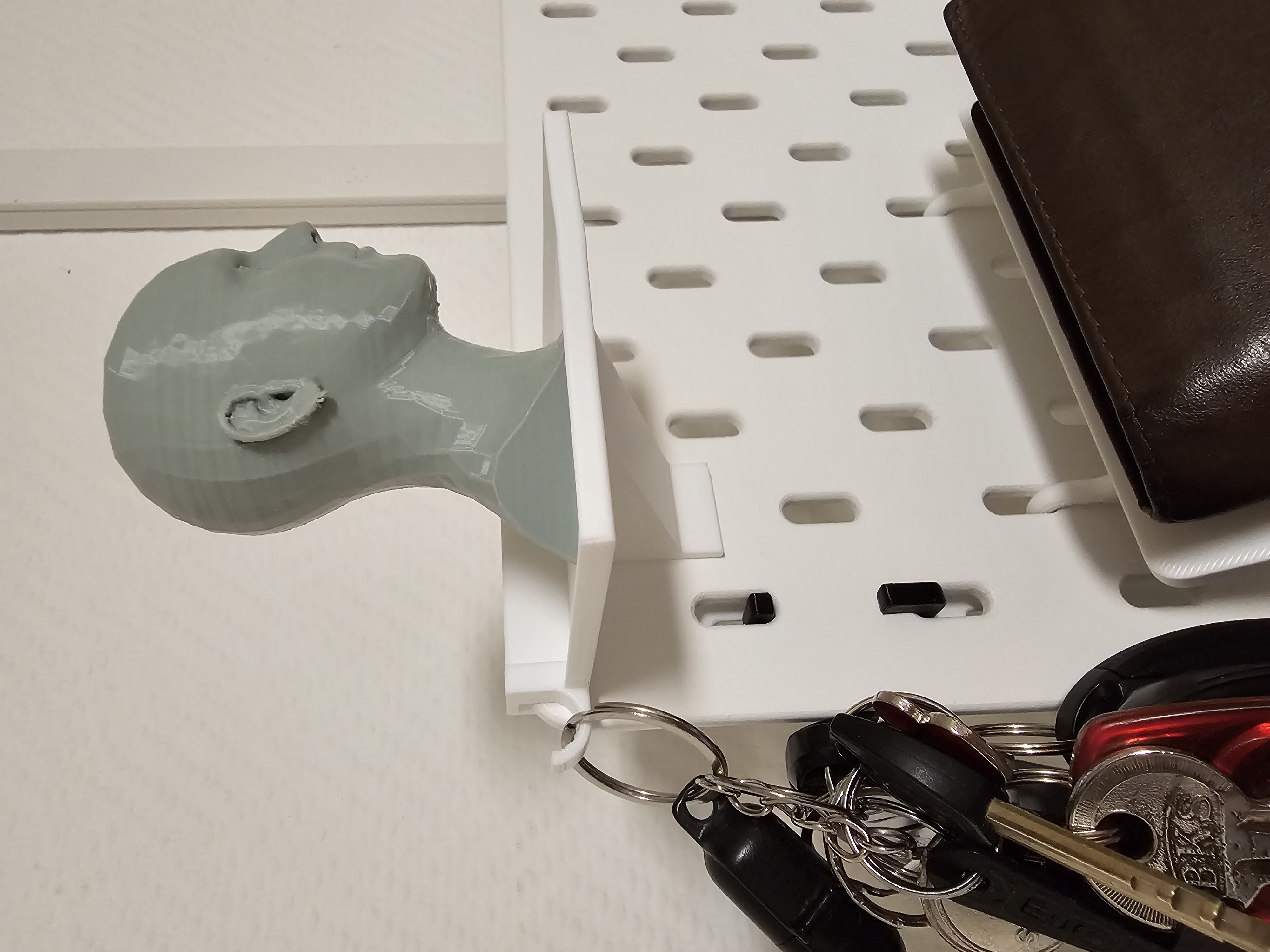 SKADIS top shelf with border and hook for keys