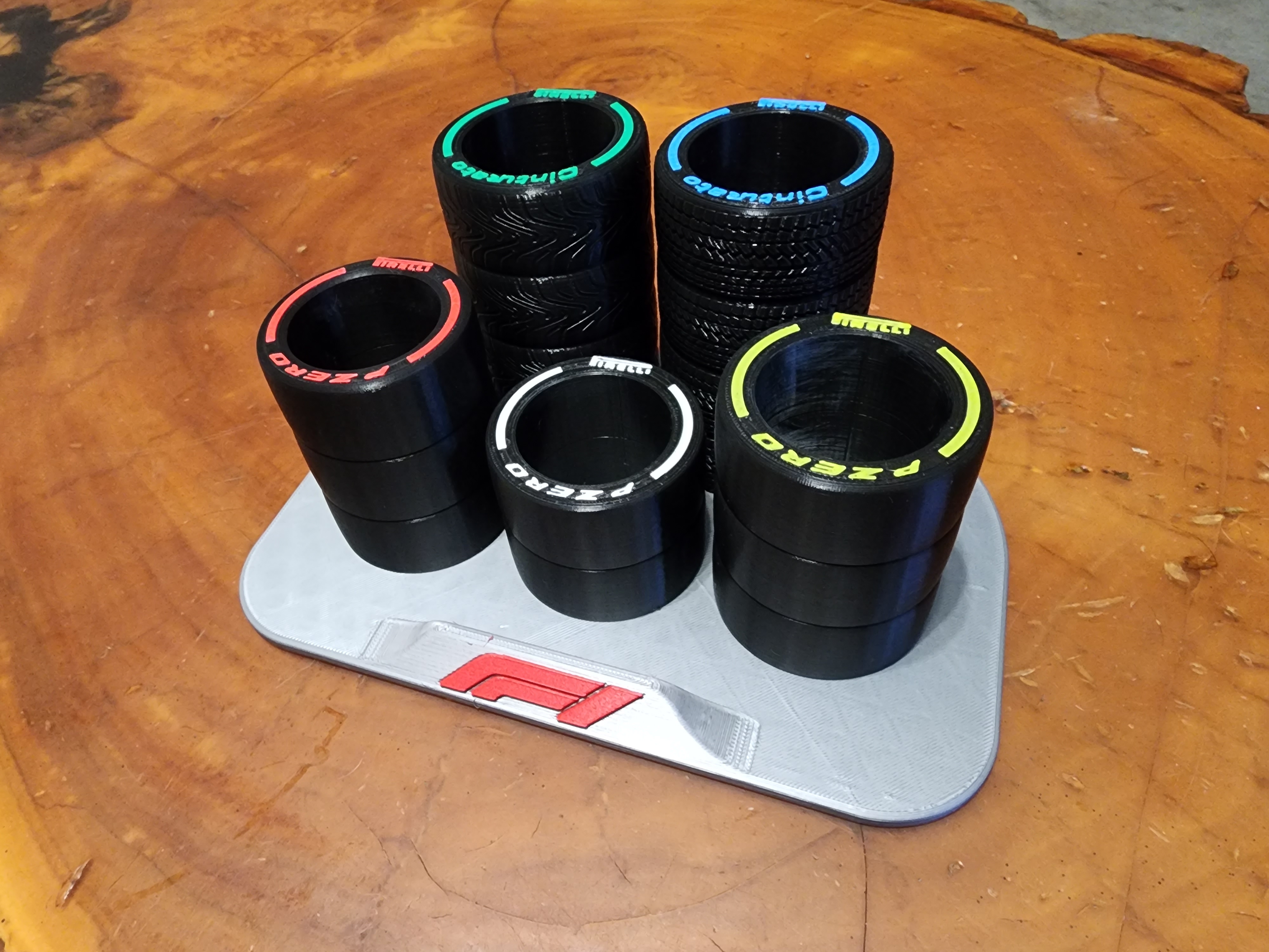 Formula 1 tire pencil holder with wets and inters.
