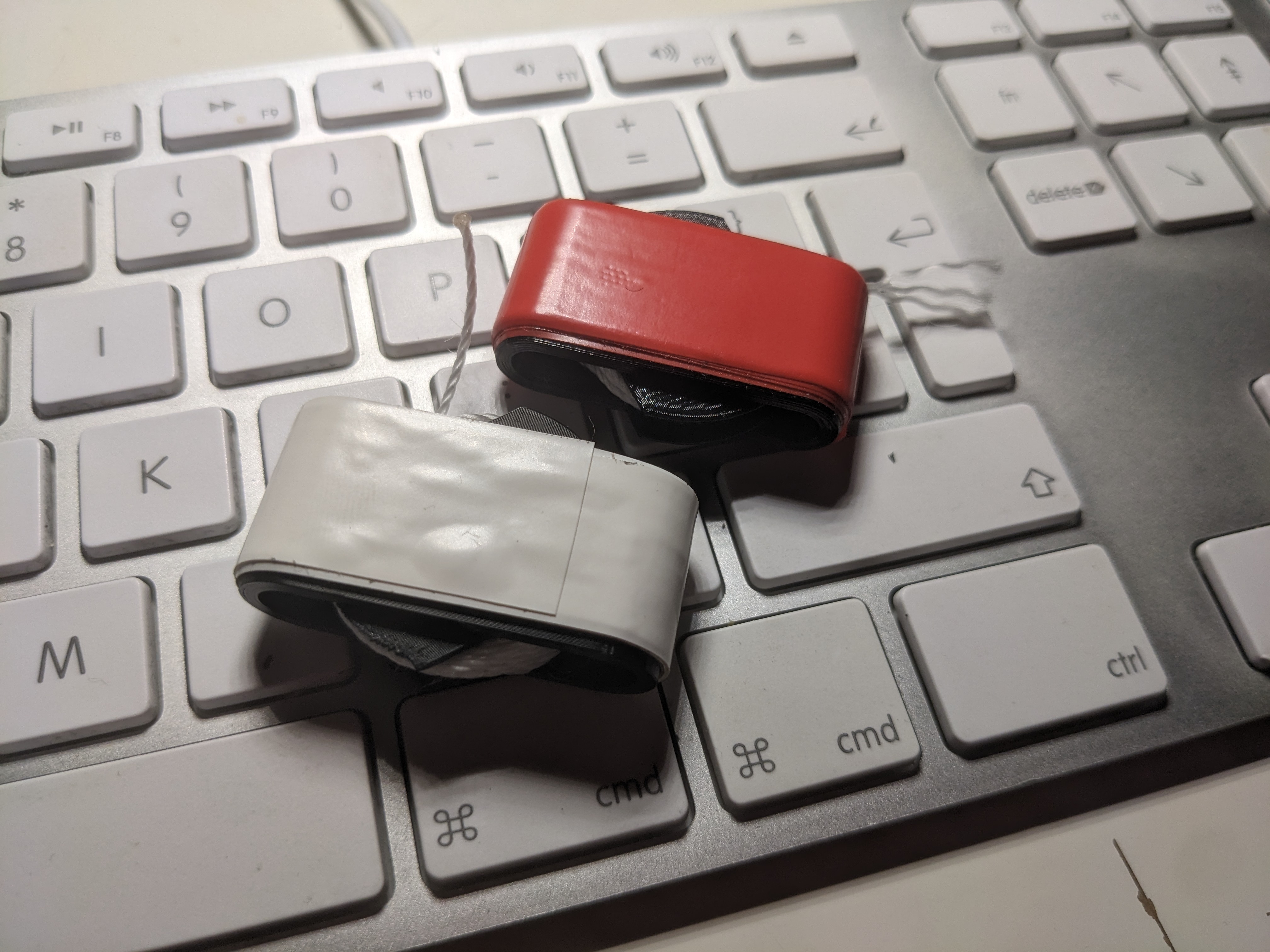 Tiny EDC cord and electrical tape spool
