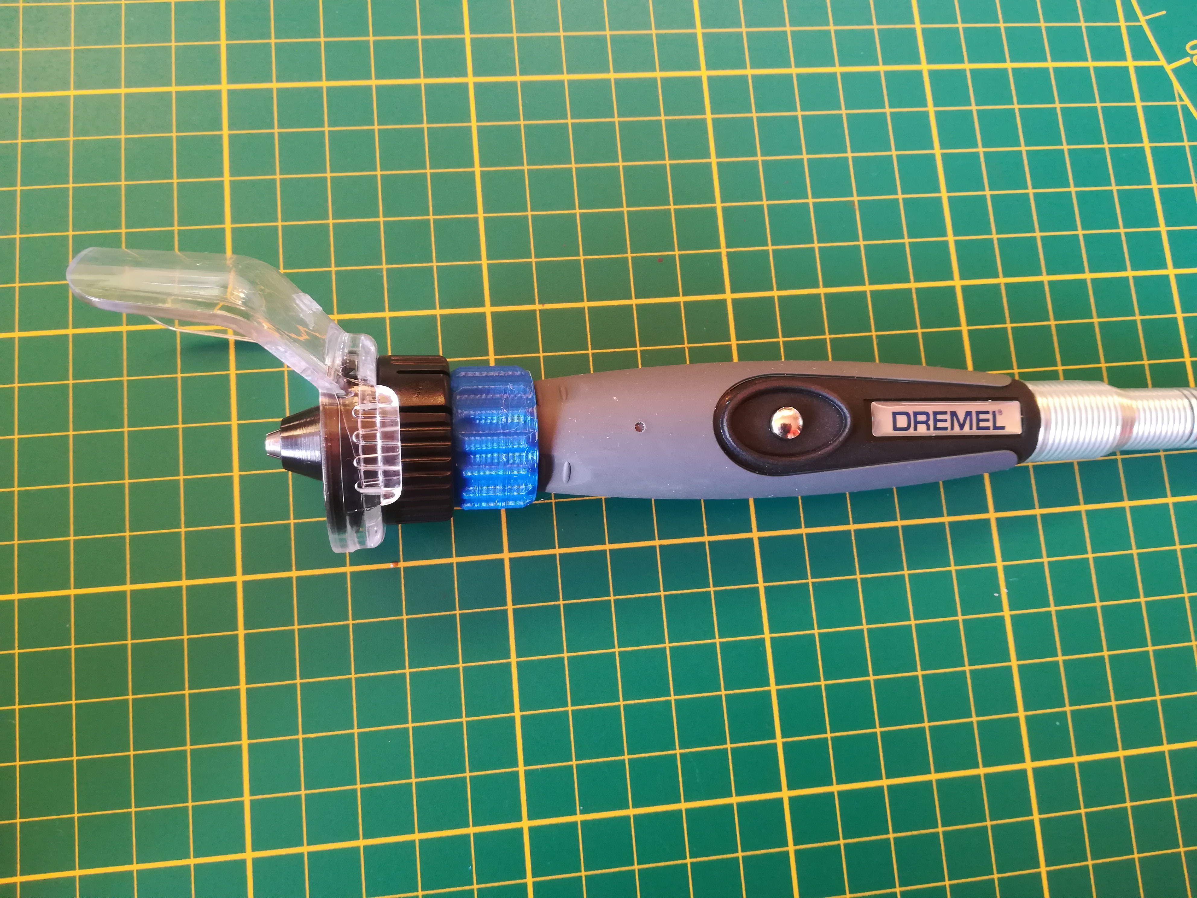 Adaptateur capot anti-projections sur flexible Dremel