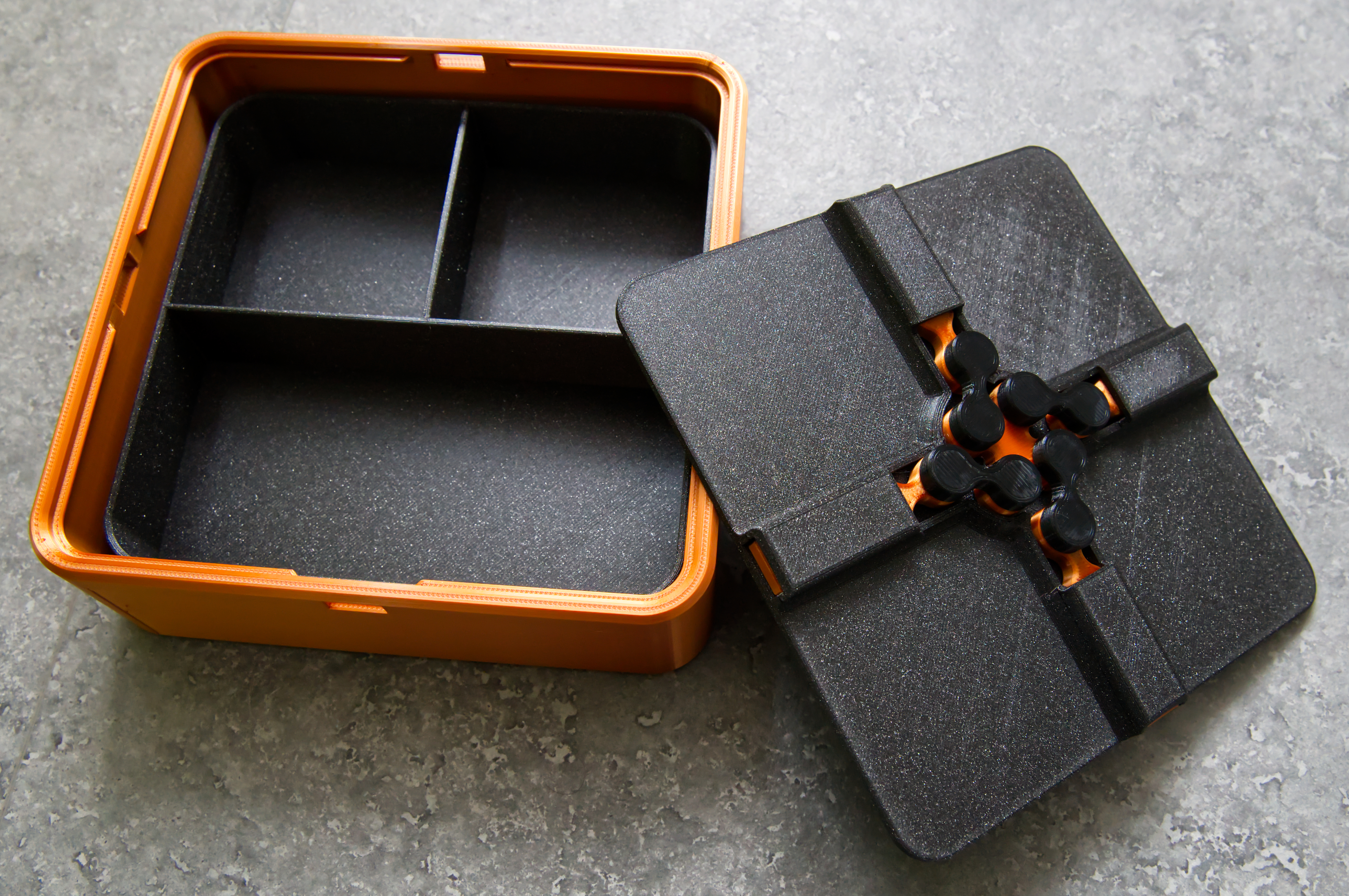 Divider for the mechanically-locking-container