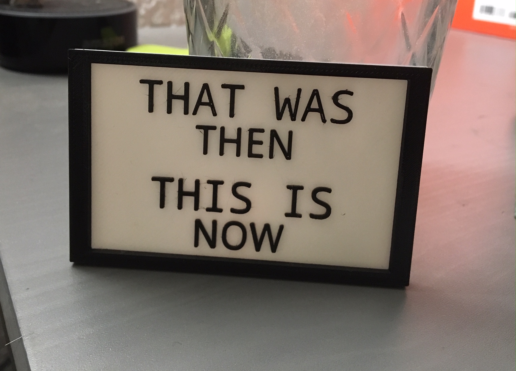 "That was then this is now" plate sign