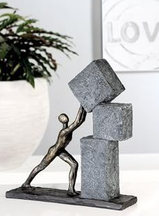 Falling stone statue