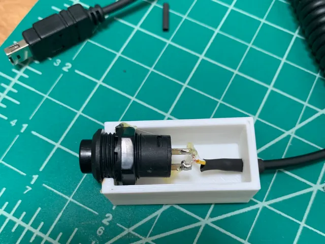 Nikon D Series Auto-shutoff Cable Container