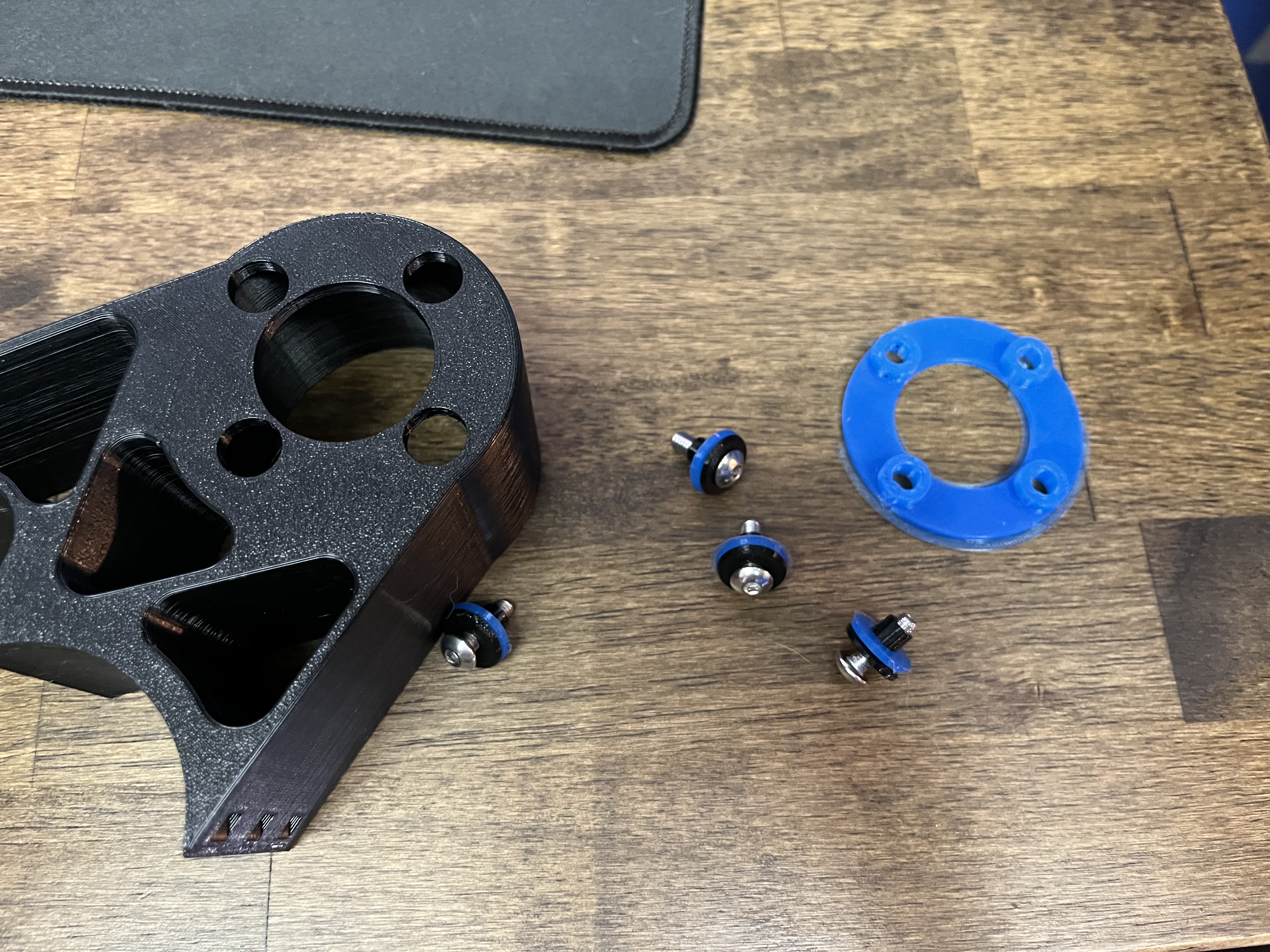 Seat belt tensioner