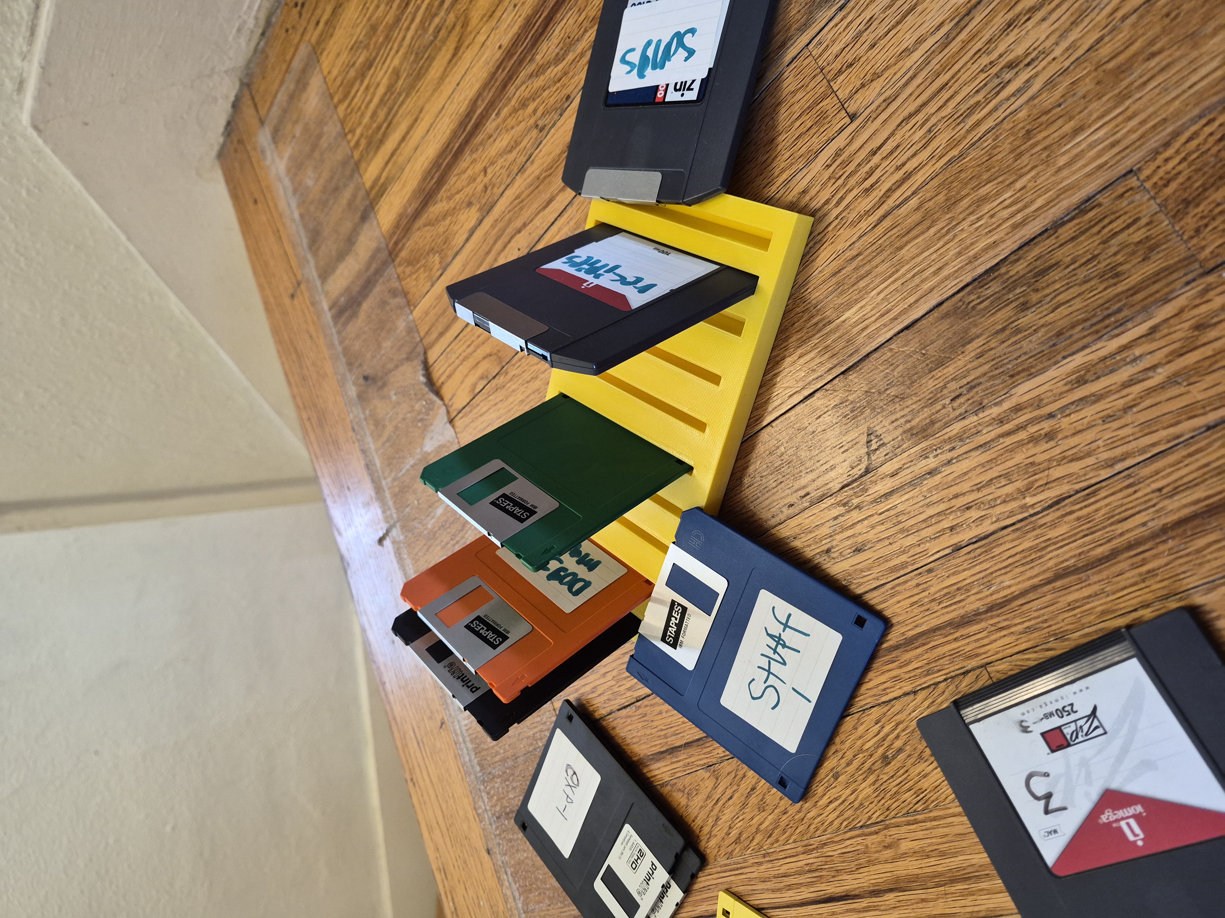 3.5 inch floppy disk holder and zip drive holder.