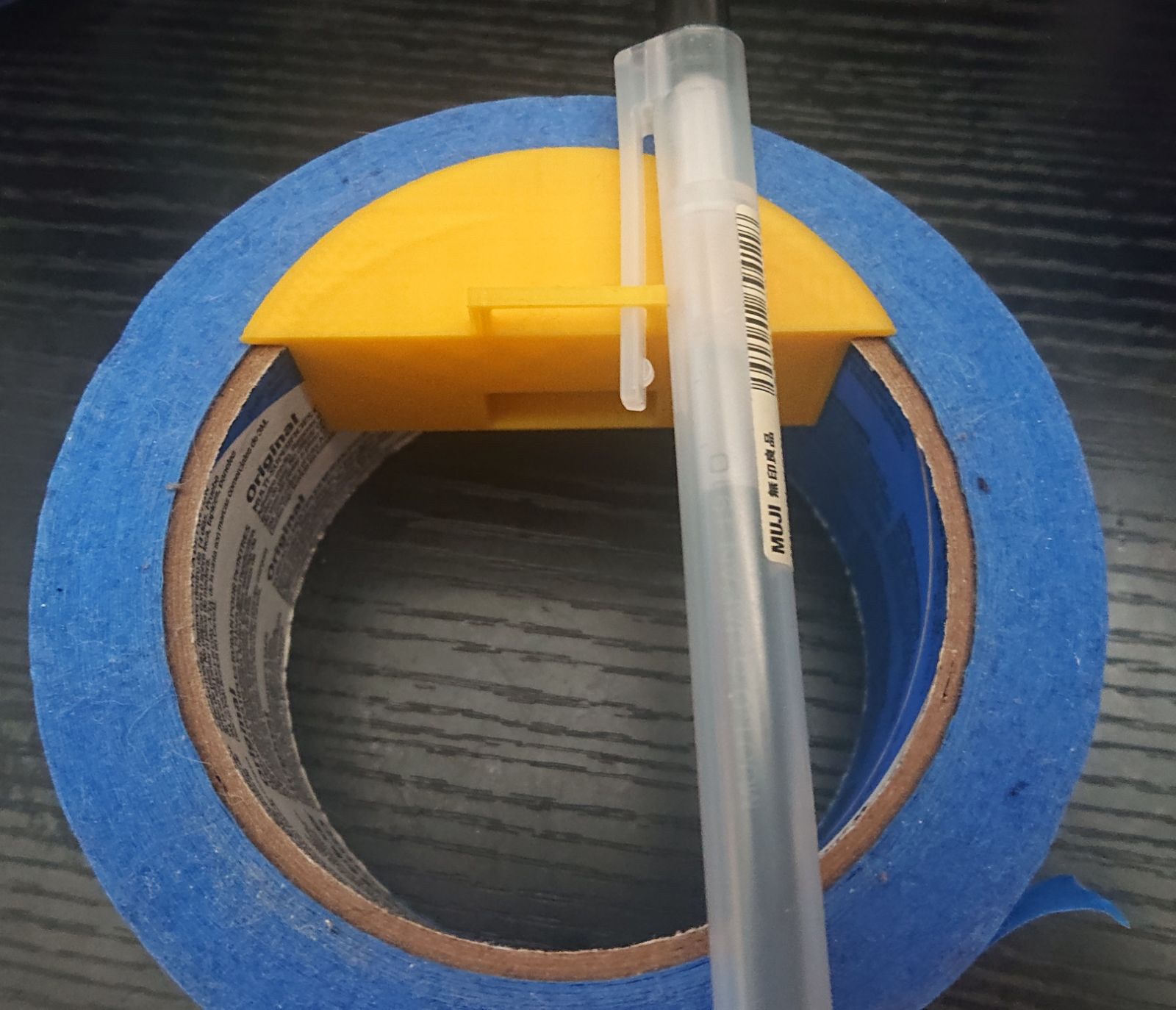 Magnetic mount for painters tape with sharpie holder
