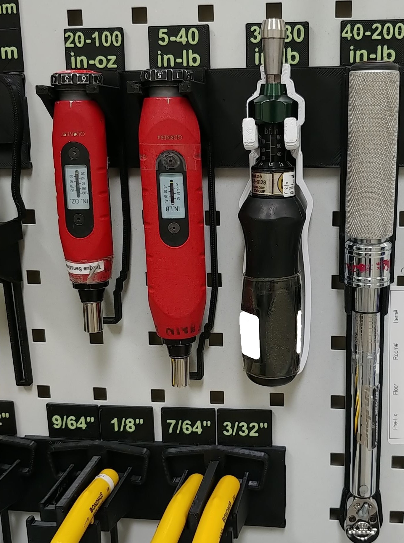 Compact, specific hand tool holders on peg board by Trevor Download