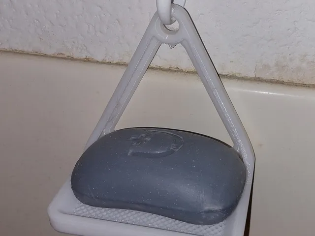 Soap Dish for hanging from a wall hook.