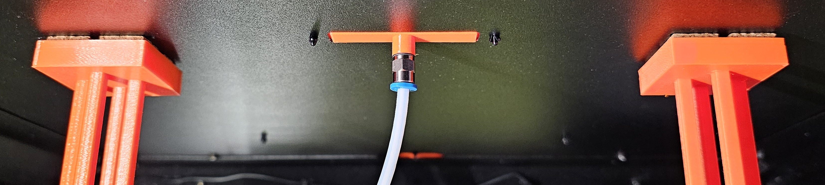 Enclosure filament PTFE feed