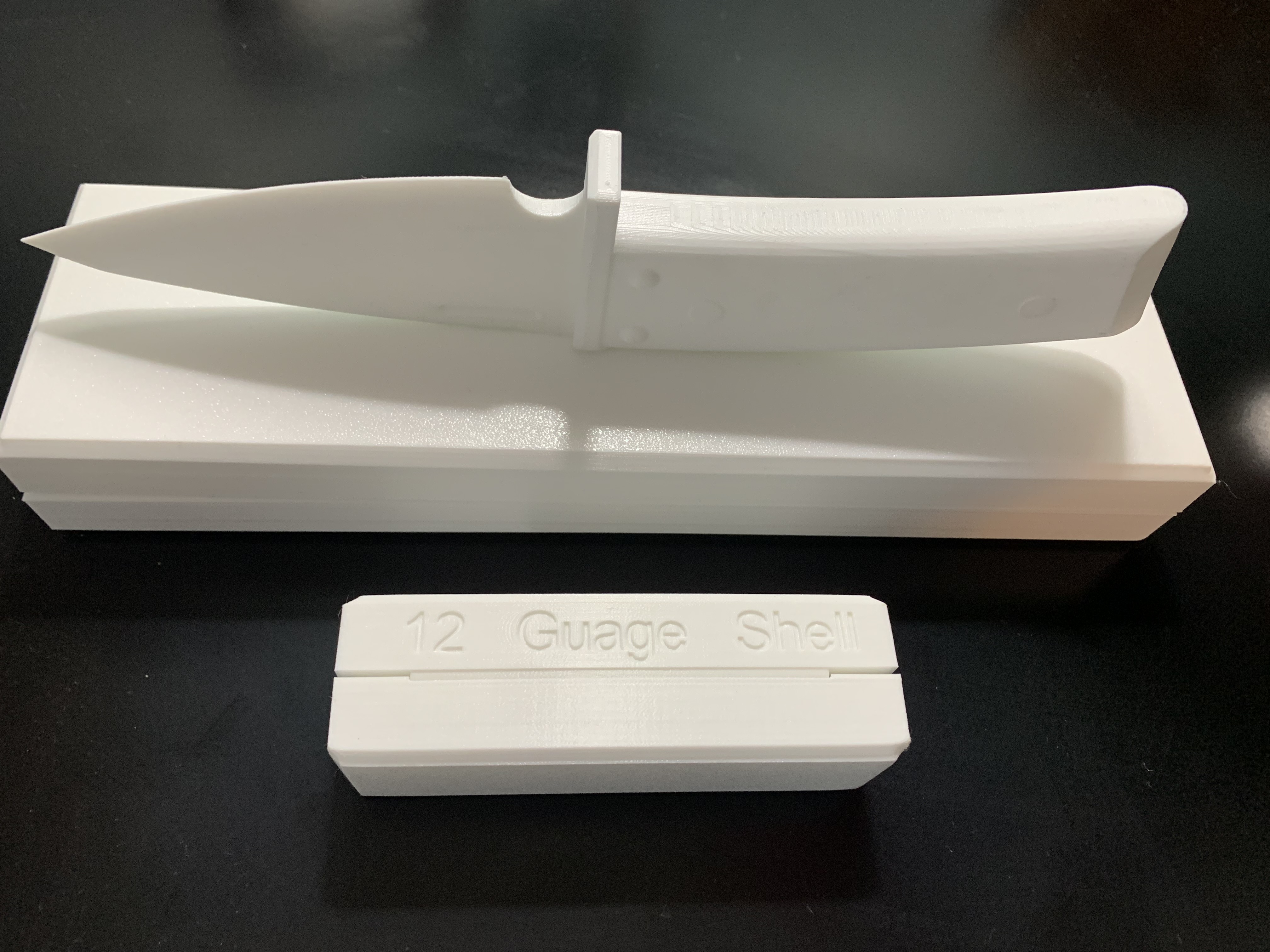 Chocolate Molds - Hunting Knife, Shotgun Shell along with actual Hunting Knife