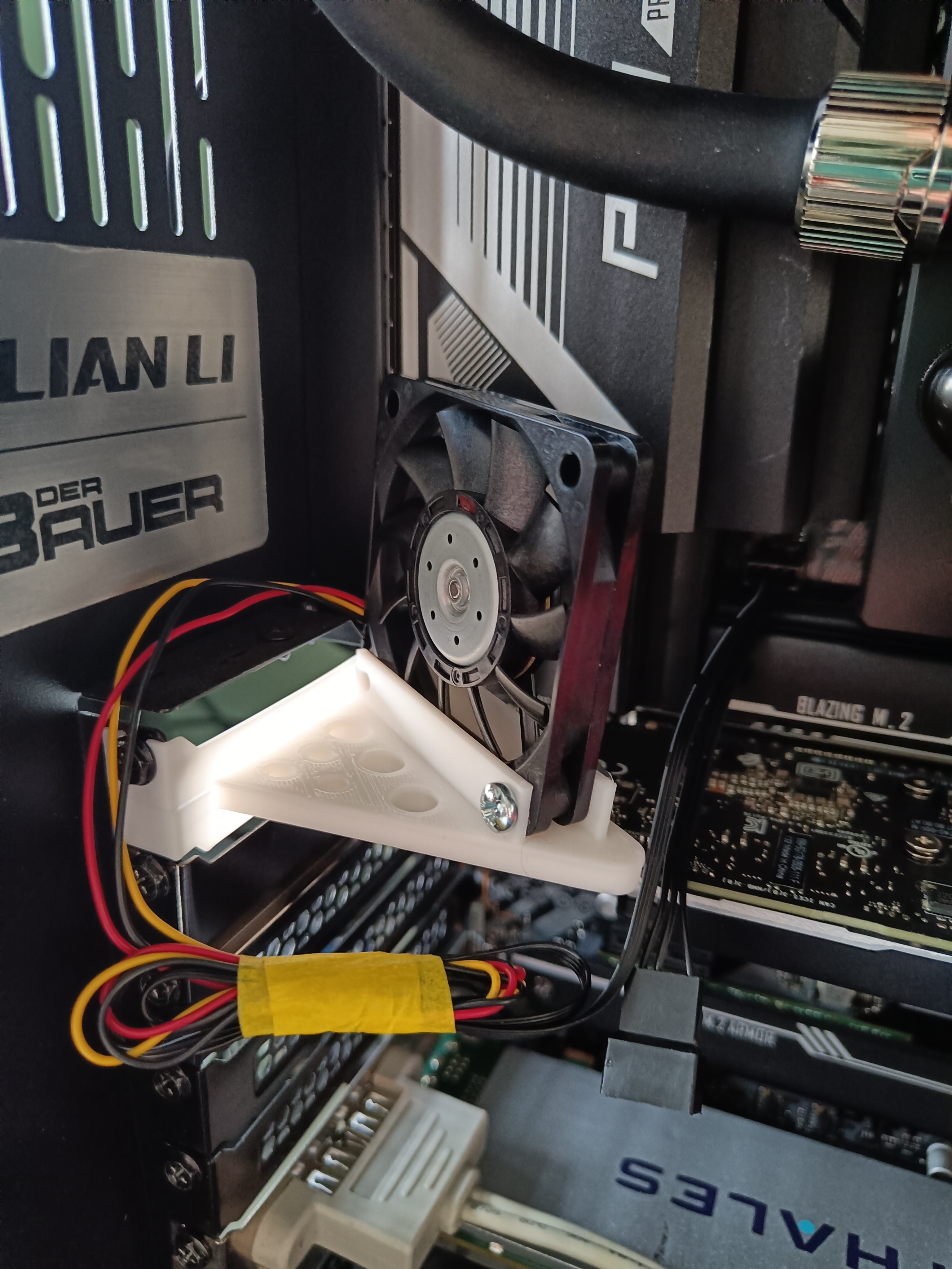 6cm fan for VRM and chipset using a PCIe slot bracket.