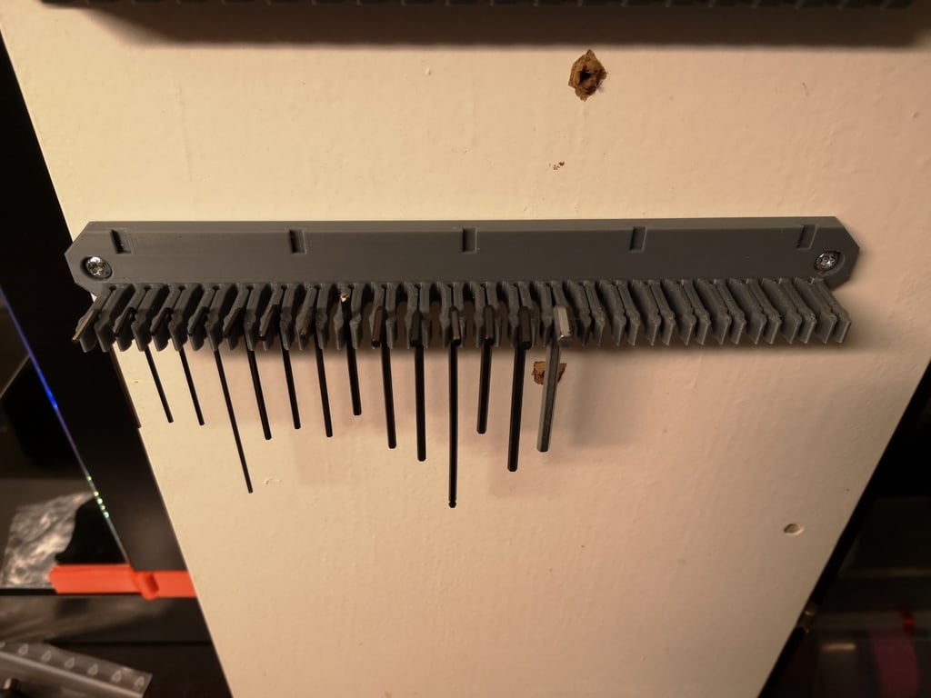 Wall mounted holder for 20 small size allenkeys, screw drivers etc.