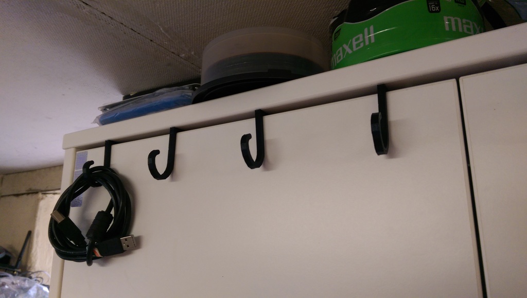 Hanger for cabinet doors