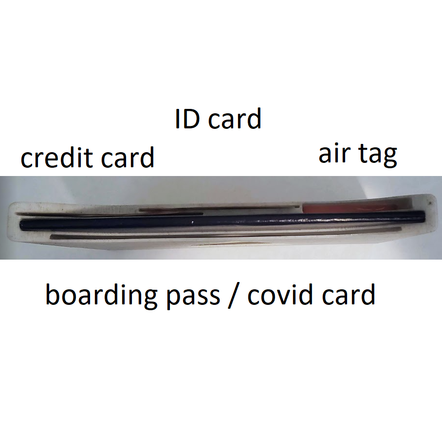 slim passport case with an airtag holder