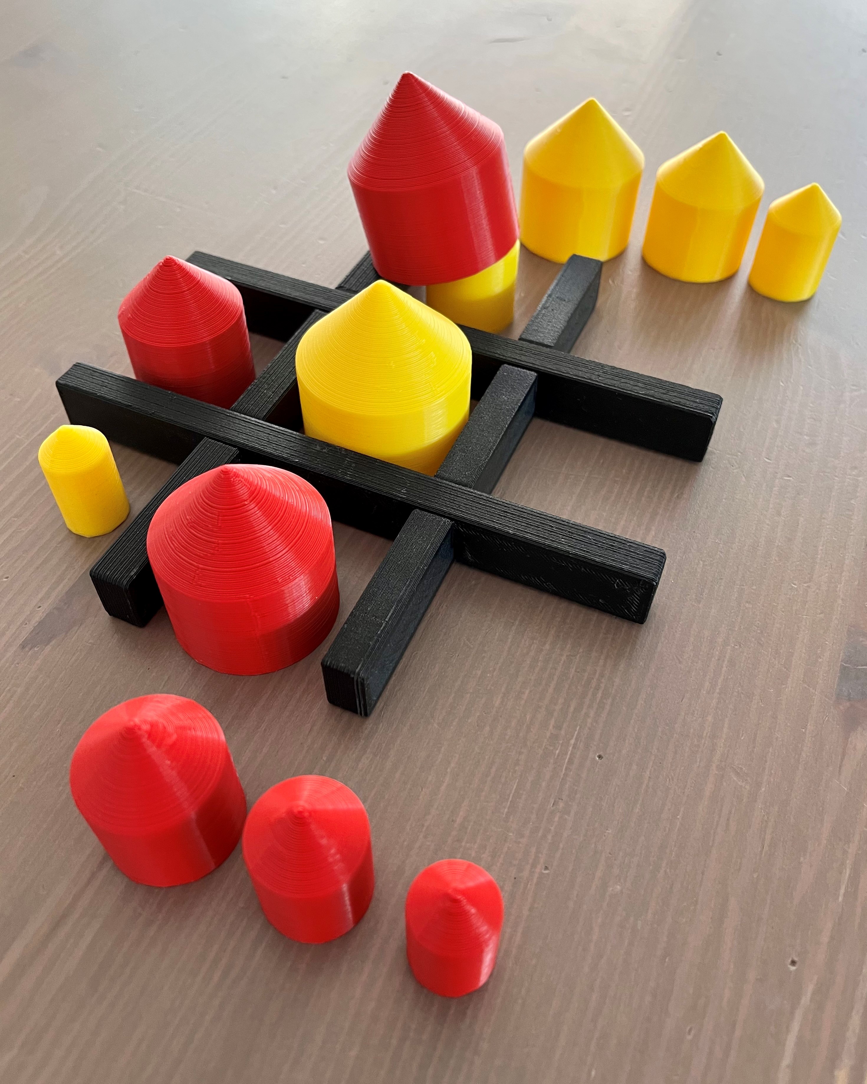 Tic Tac Toe with stackable tokens
