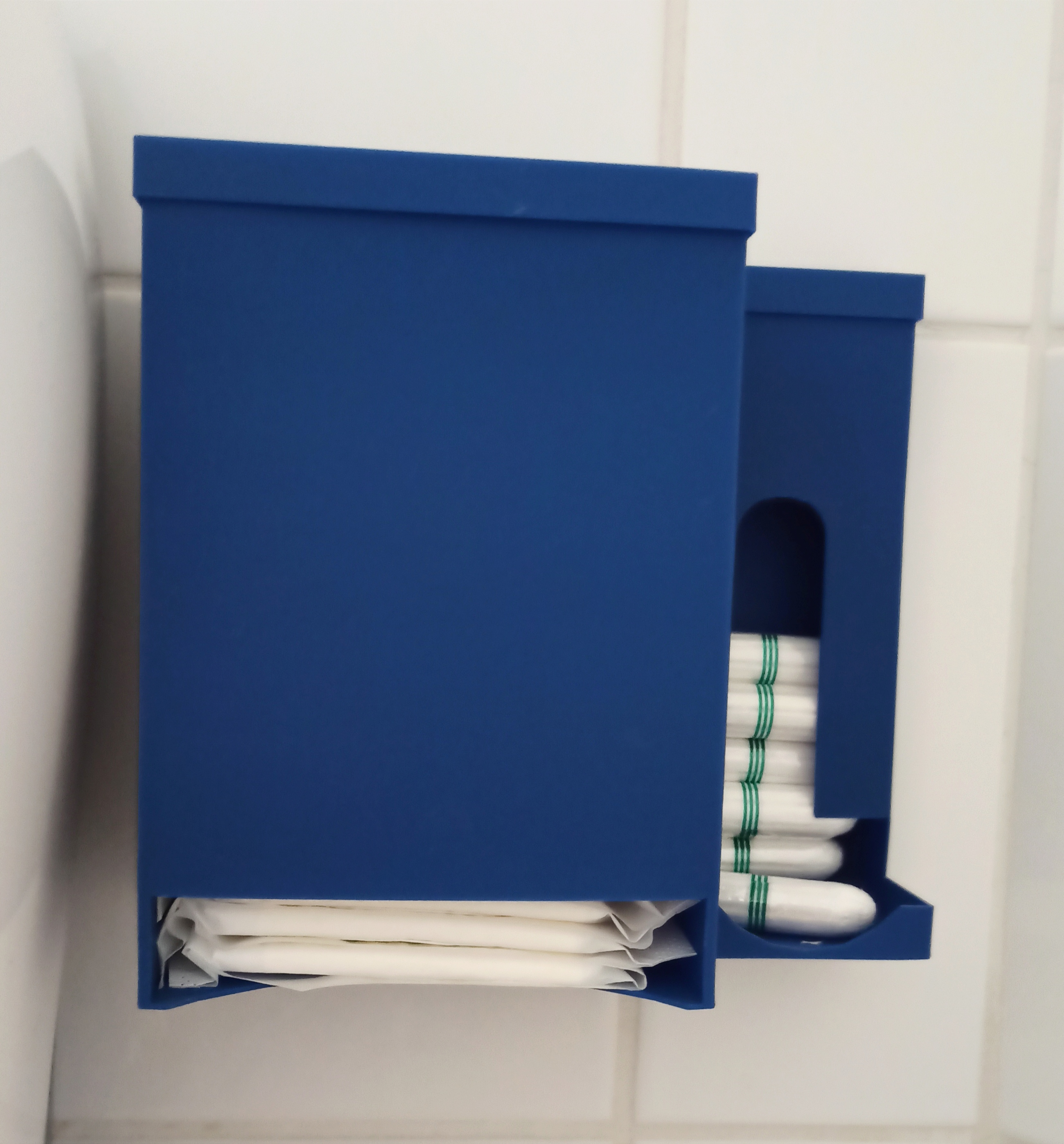 Menstrual product dispenser