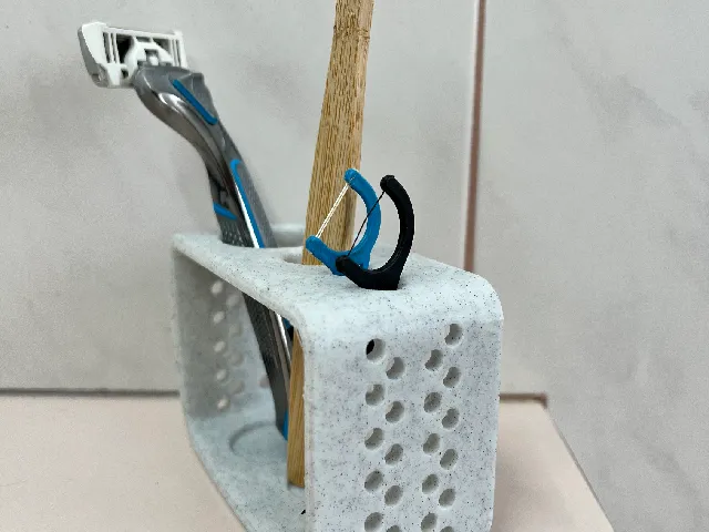 The Bachelor, Razor and toothbrush holder for one.