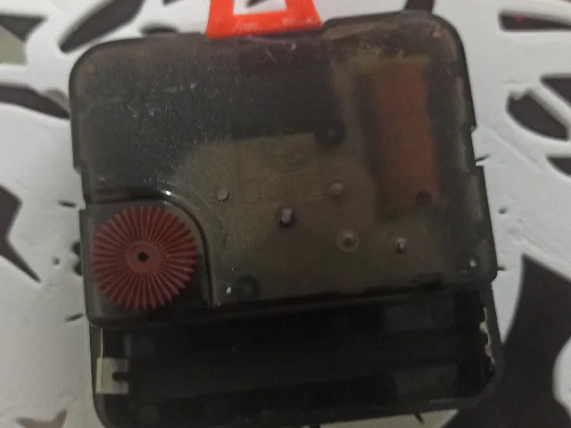 Wall hanging bracket for clock mechanism