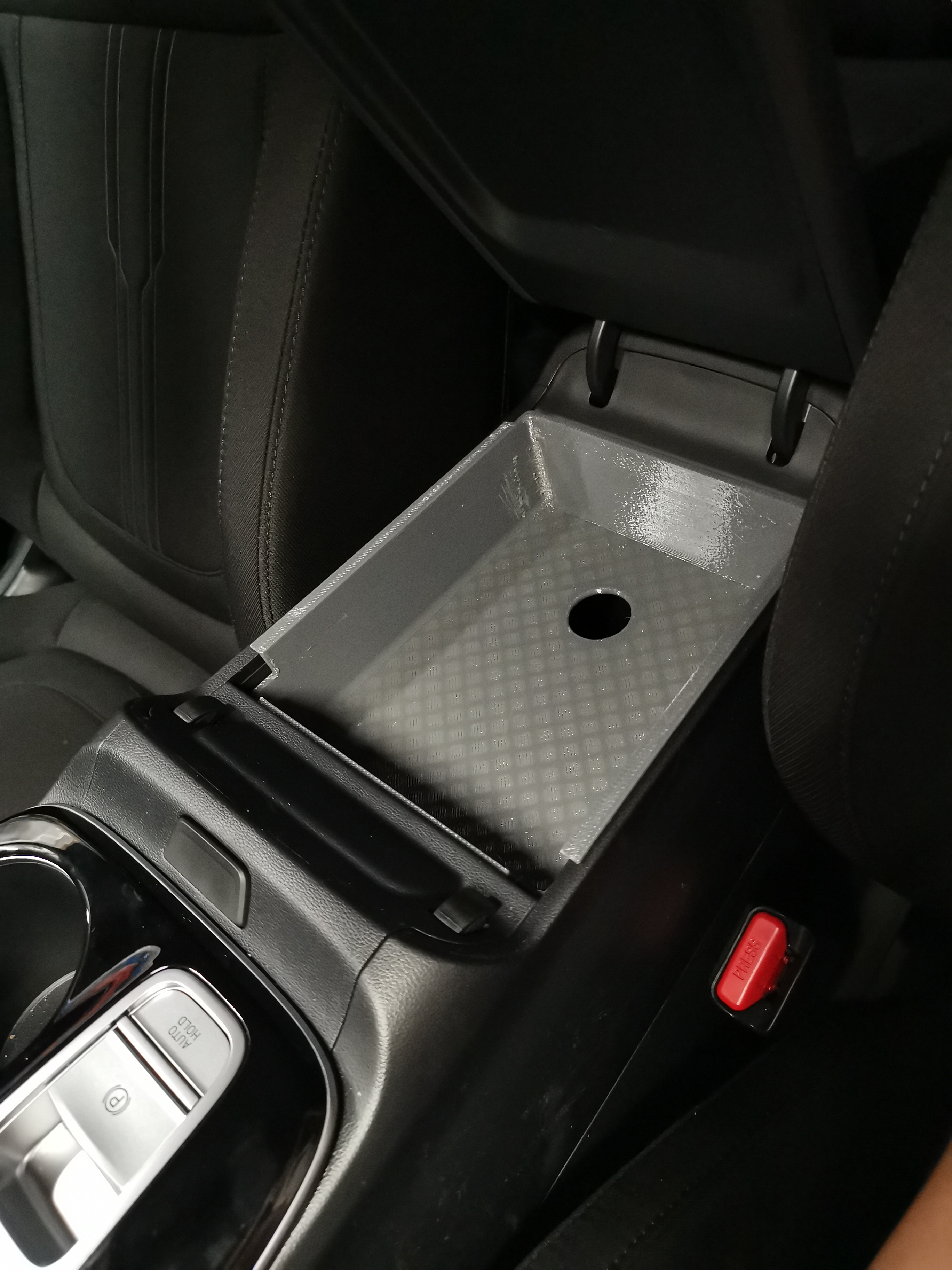 Hyundai Tucson NX4 (2024) Central armrest storage box