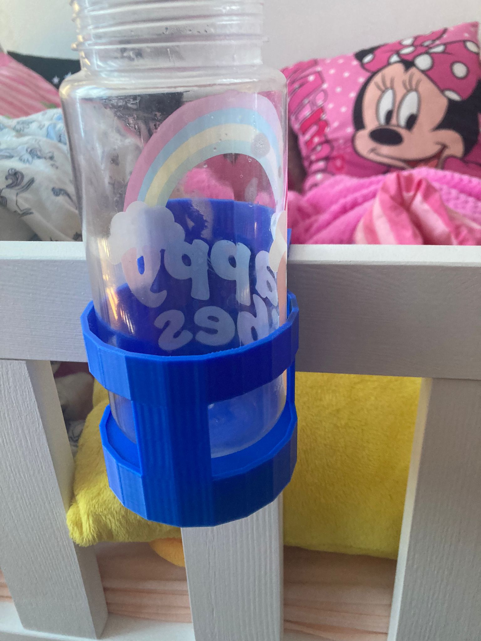 Bottle holder for children's bed