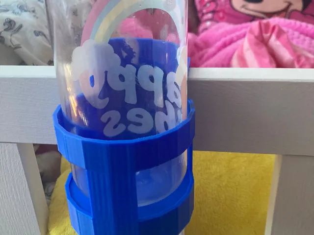 Bottle holder for children's bed