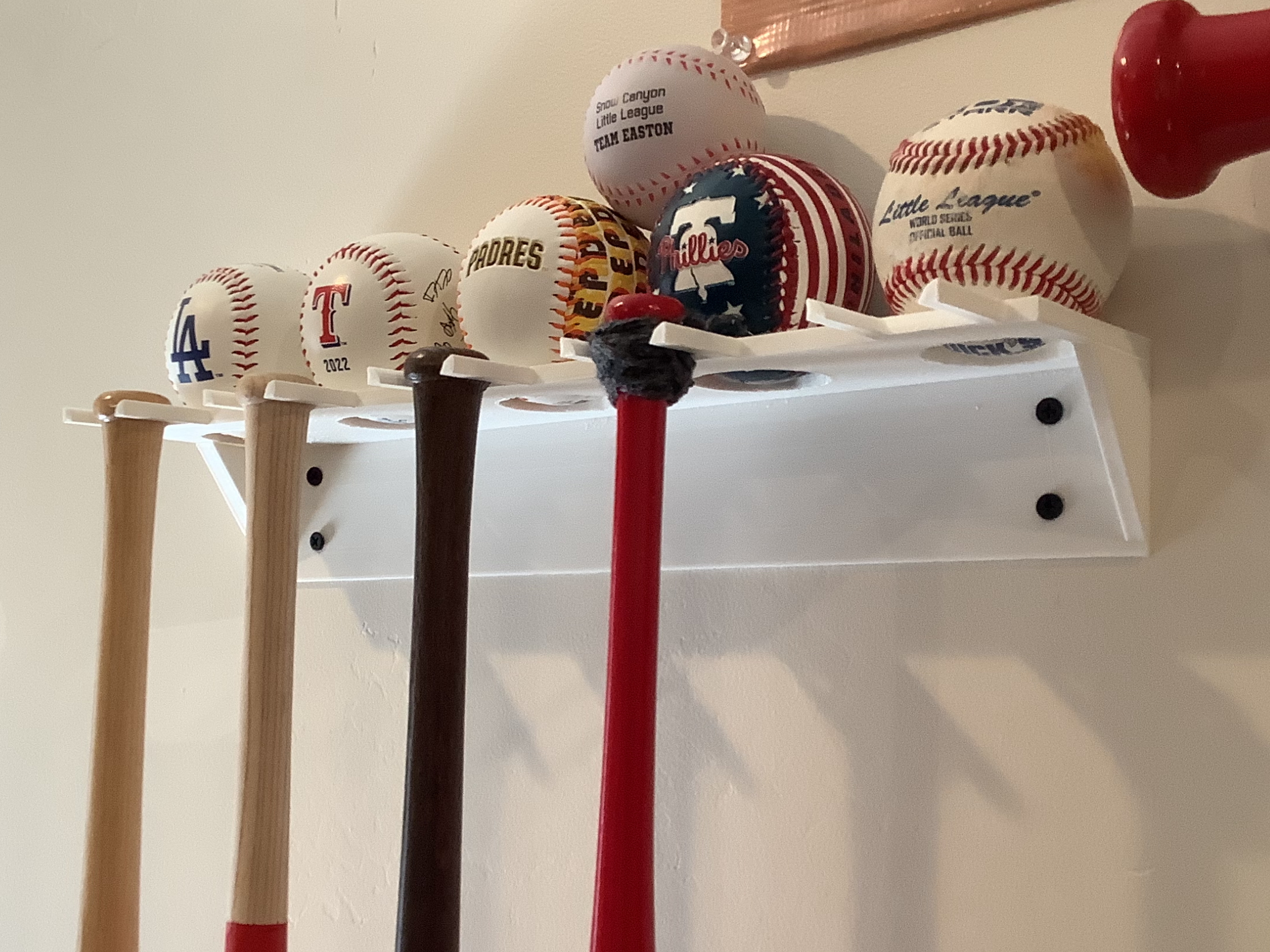 mini bat and souvenir ball display