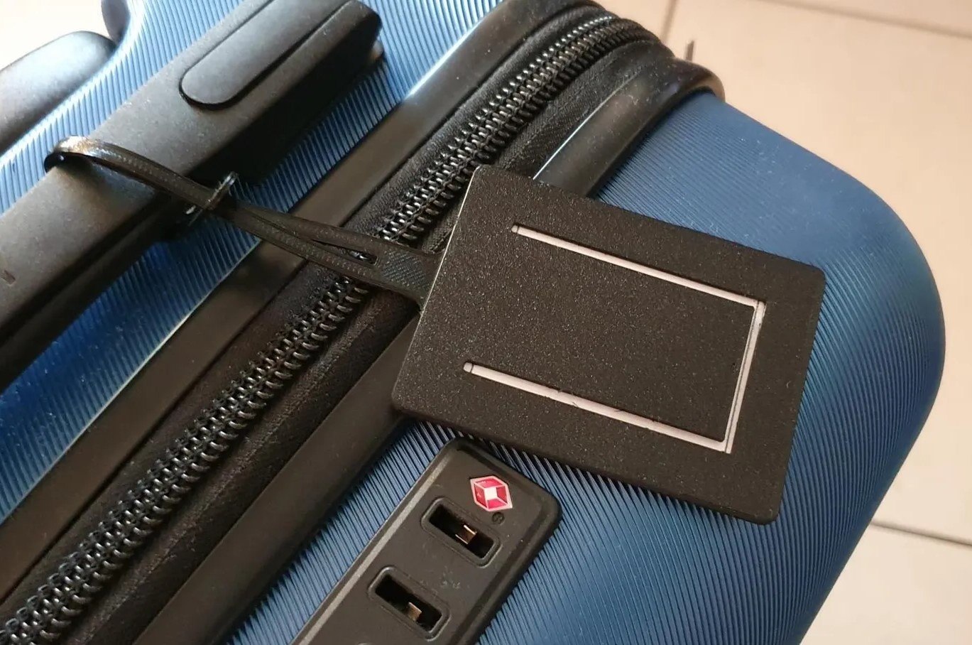 Luggage name tag with privacy