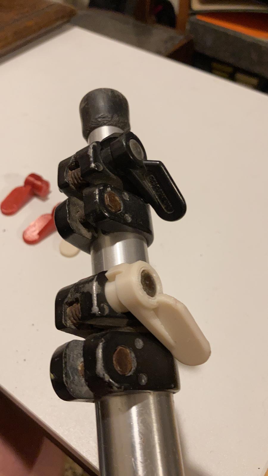 Manfrotto tripod leg clamp screw holder