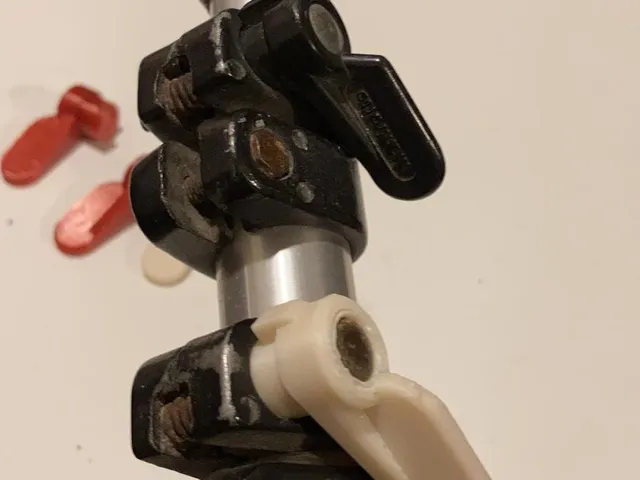 Manfrotto tripod leg clamp screw holder