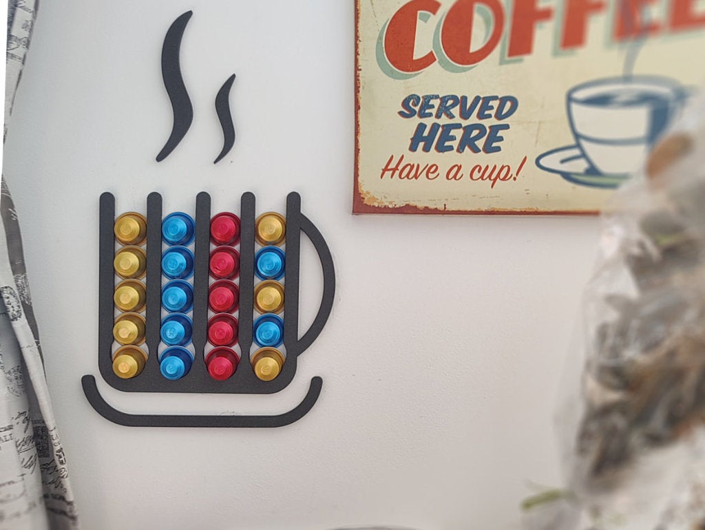 Wall mounted, mug shaped Nespresso capsule dispenser
