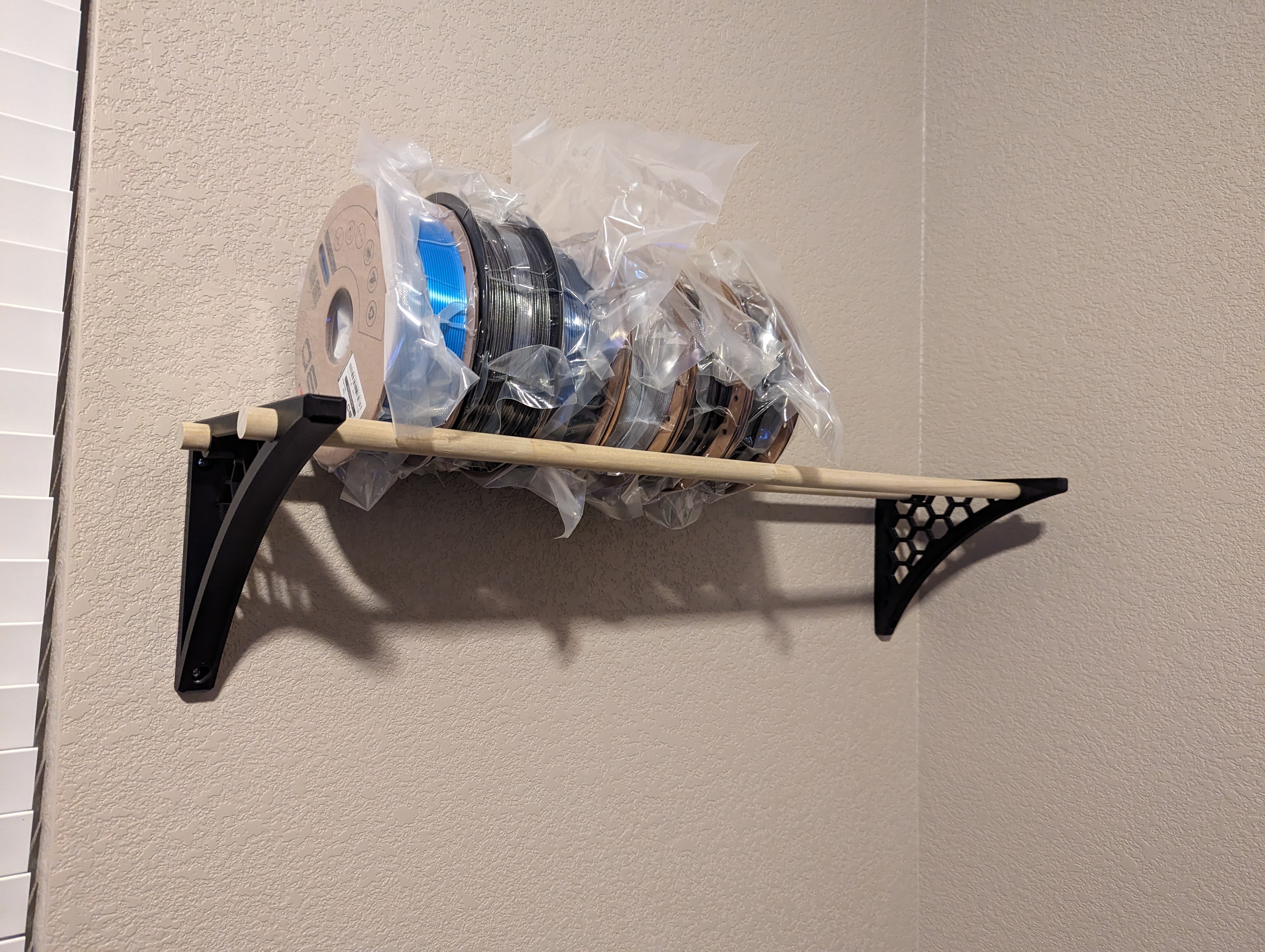 Wall mounted filament rack