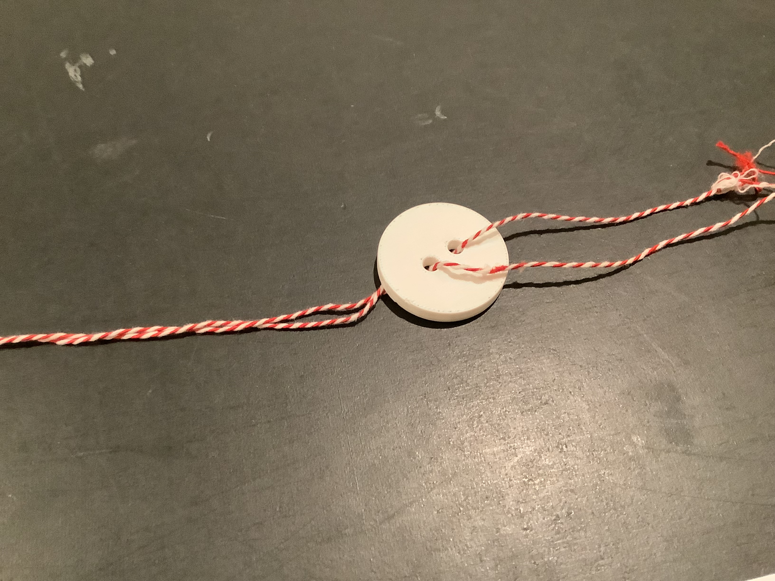 spinning button toy