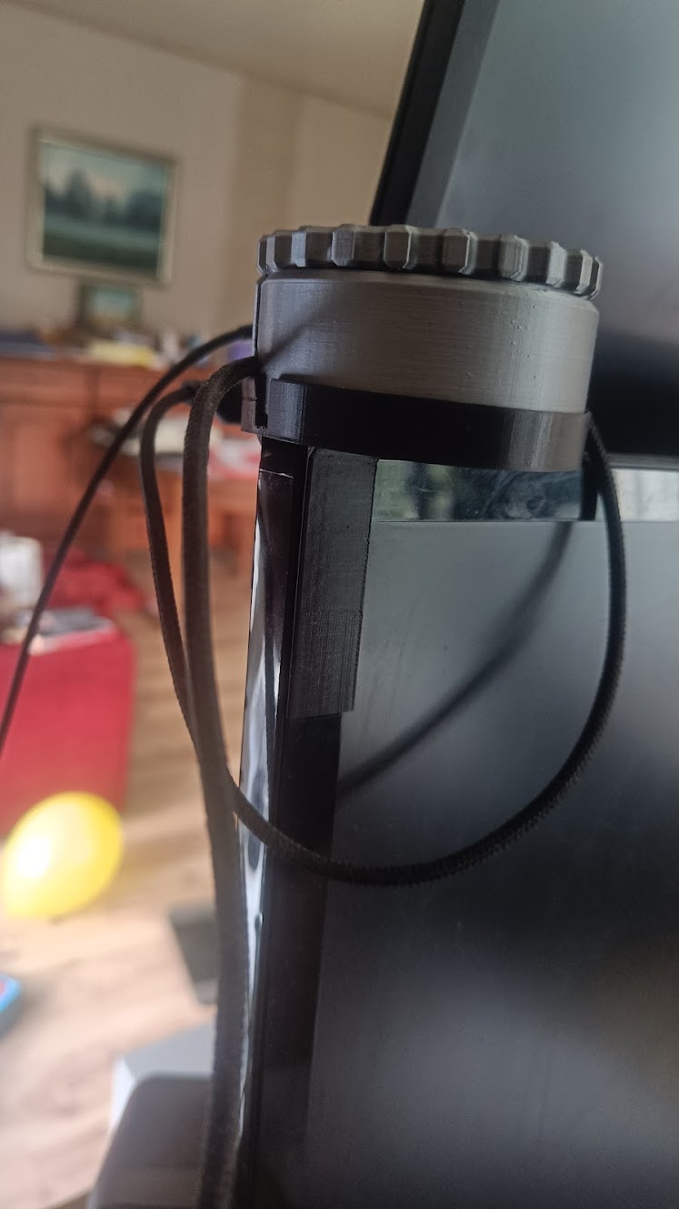 Cable reel holder for screen